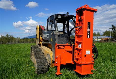 skid steer post driver with grapple|skidsteer mounted post pounder.